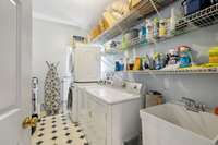 The utility room has plenty of shelf space. 2326 Amber Glen Dr.  Murfreesboro, TN 37128