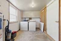 The Laundry room is HUGE! located on the bottom floor, off of the den/ family room. Need more storage? Lots ot extra space here!
