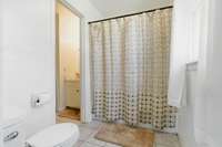 Bathroom from the primary bedroom entrance.