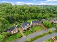 Located in the desirable Wynbrooke neighborhood and zoned for Station Camp schools! Enjoy these stunning drone views showcasing the home, peaceful community, and convenient proximity to the lake, shopping, dining, and more.