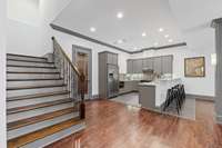Basement-level living includes spacious full-sized kitchen.