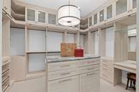 A spacious, well-designed closet with ample storage, perfect for keeping your wardrobe organized and easily accessible.