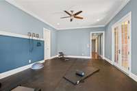 Ground-floor bedroom is perfectly suited for a multitude of uses.