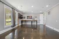 Featuring new flooring, windows, and doors, this space is ready for creativity to flow.