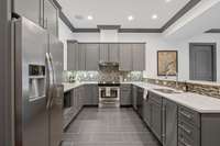 Basement-level living includes spacious full-sized kitchen.