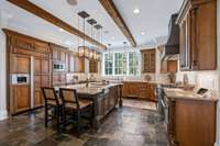 Cook and entertain in style with this spacious kitchen, seamlessly connecting to the living areas.