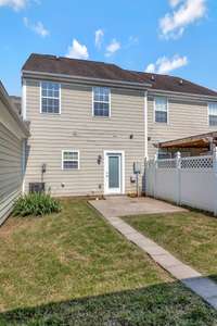 This back private back yard has a beautiful fenced garden area for kids and/or pets to play and enjoy.