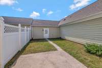 Paver path leads to your own two car garage.