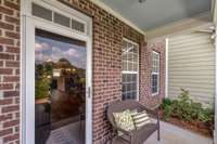 Enjoy your morning coffee on this cute, little front patio.