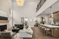 Spacious great room featuring soaring ceilings for an open, airy feel.