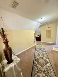 upper level wide hallway