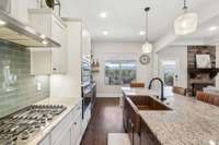 Notice the huge kitchen island.