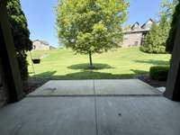The back patio has the best of both worlds!  Both covered and open.  Many neighbors have screened in their back covered space!