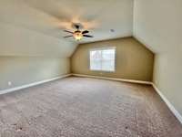 Nice bonus room upstairs - or use as bedroom #3.  This space has a closet and a full bath.  (Quilters...bring your 'long arm' here - this room is large and perfect for it!)