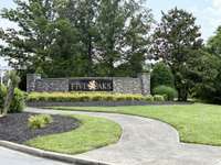 This is the main Five Oaks neighborhood entrance from Hwy 70.  Beautiful upscale living!