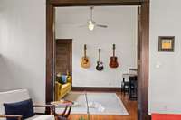 The Living room flows into the 'Music Room' or this could be office or even Bedroom #5