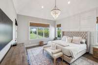 Escape the hustle and bustle in this serene primary suite, located on the main level for ultimate convenience.