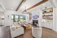 The centralized family room seamlessly connects to the kitchen and breakfast area, creating an effortless flow for entertaining.