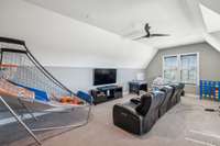 The bonus room serves as a fantastic entertainment hub. Whether you’re grabbing a bowl of popcorn for movie night or inviting friends over for a game of poker or board games, this versatile space is ready for fun