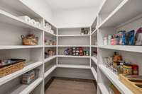 Don’t miss the walk-in pantry just off the kitchen, offering ample storage for all your culinary essentials.