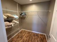 Large walk in closet in apartment.