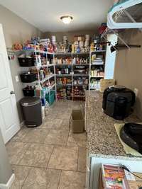 Huge pantry and laundry room combo.