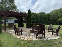 Pergola, swing and fire pit