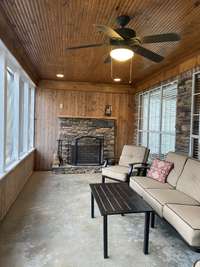 Screened in porch is perfect for relaxing in the summer and winter! Wood burning fireplace lets you cozy up on those cool evenings!