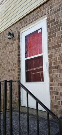 Front entrance with newly painted door.