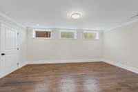 Basement room that can be utilized as gym/secondary office.