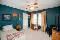 The second bedroom is nearly as large as the first, measuring 11'9" by 12' 3"