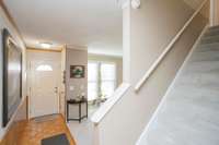 Upstairs are two bedrooms and a full bathroom.