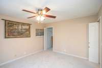 This bedroom measures 11'8" by 12'8" and has a LARGE walk-in closet.