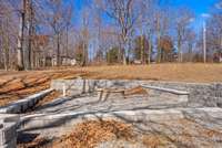 They had planned to make this a pool house.    Firepit can be moved....