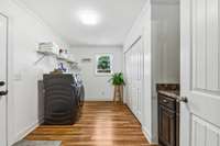 Very nice and large laundry room.