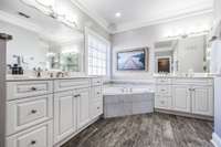primary bathroom is HUGE and features double vanities, soaking tub, and gorgeous shower
