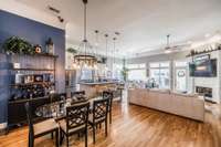 The foyer opens to a spacious open floor plan with hardwoods throughout!