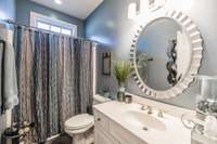 hall bath serves guests and both secondary bedrooms