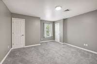 Large bedroom with a large walk-in closet. 4th of 4 bedrooms upstairs.
