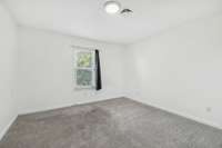 Additional bedroom upstairs: 1 of 4 bedrooms.