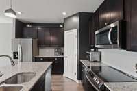 Fridge doesn’t convey, & no longer in the kitchen. Pics to prior to seller moving out.