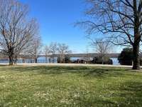 A front yard view of the lake in the winter months.