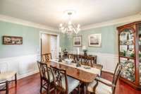 The formal dining room has ample space to appoint your dining table, hutch and sideboard.