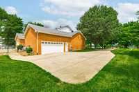 There are pull down steps within the garage that walk up to a VERY large floored storage space.  Upon visiting the home feel free to check it out. You will not believe how big the storage space above the garage is until you actually see it.
