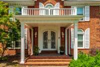 A stunning portico upon entering the front door. A grand entry to a classic home.