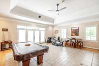 The french doors on the rear wall of the recreation room lead out to the pool. This a an incredible space that can be used for so many things.