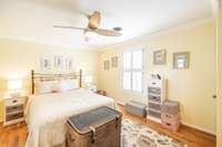 Upstairs guest room also faces the lake. Cheerful spacious and sunny!