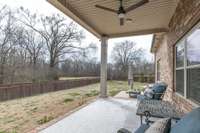 Covered porch is the perfect place for relaxing.