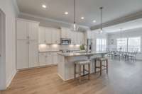 Kitchen has plenty of countertop and cabinet space for all your cooking needs.
