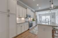 Stainless appliances and under cabinet lighting.
